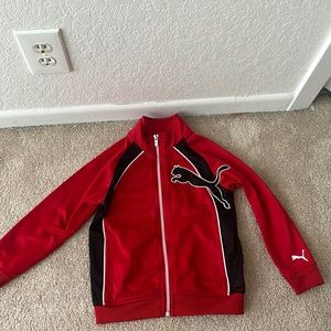 Red,black and white jacket good condition.